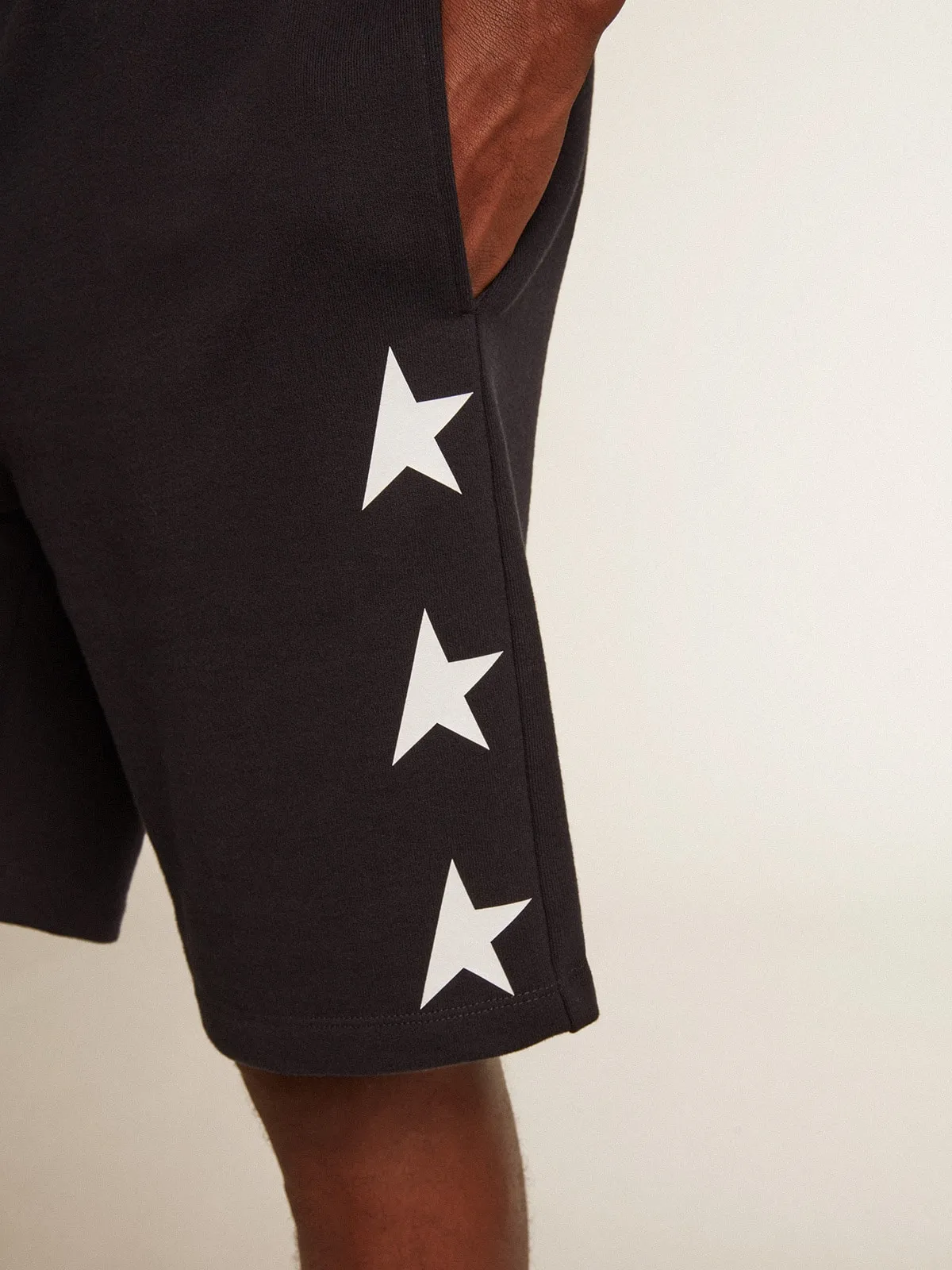 Men's black bermuda shorts with white stars